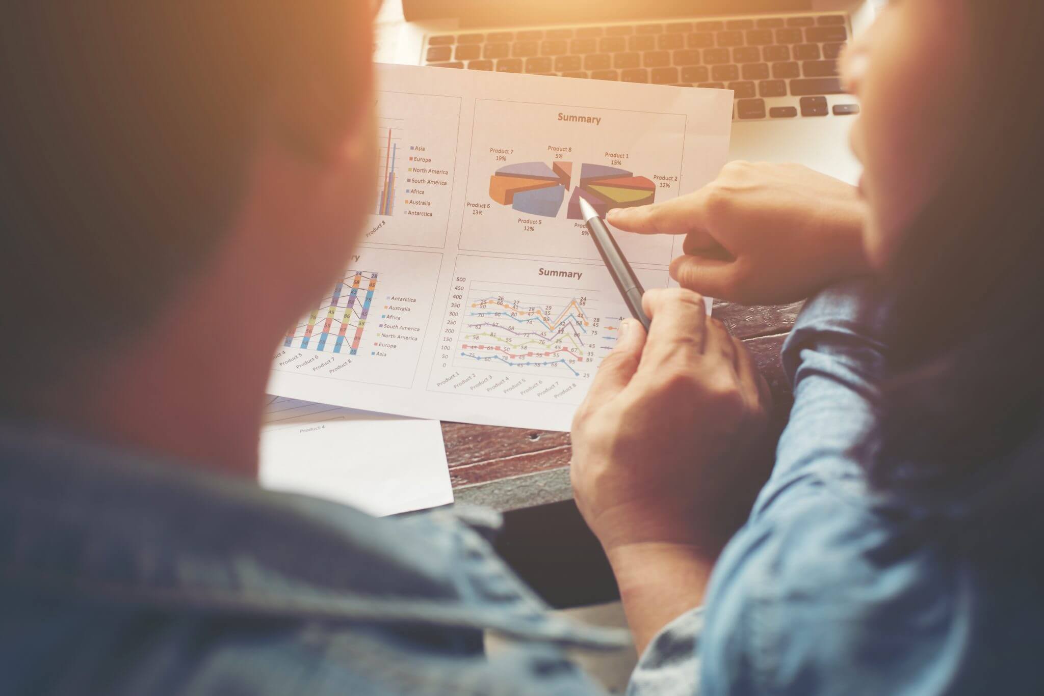 Close up of business team meeting discussion documents ,charts a